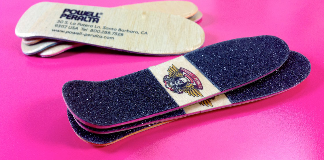 Creative business cards shaped as Skateboard