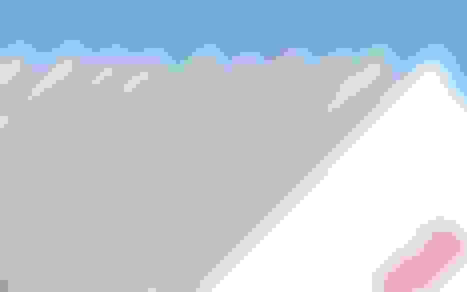 Triplex 3-ply business cards showing triple-layered 36pt cardstock with colored center core by Jukebox Print