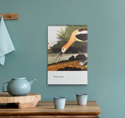 Custom wall calendar hanging on a wall