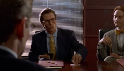 American Psycho business card scene with Patrick Bateman comparing cards