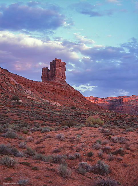 Landscape photograph of red rocks and morning sky