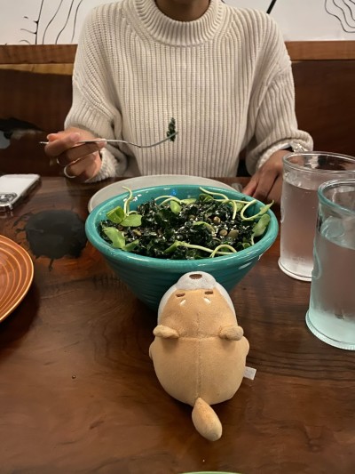 Getting her greens at Oven & Shaker in Portland