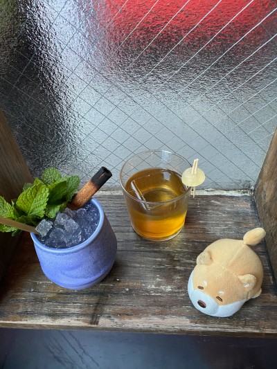 posing with some tasty cocktails at Trick Dog