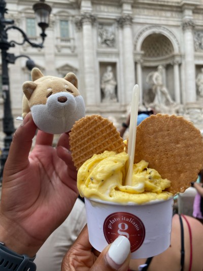 Posing with passionfruit gelato by the Trevi Fountain in Rome