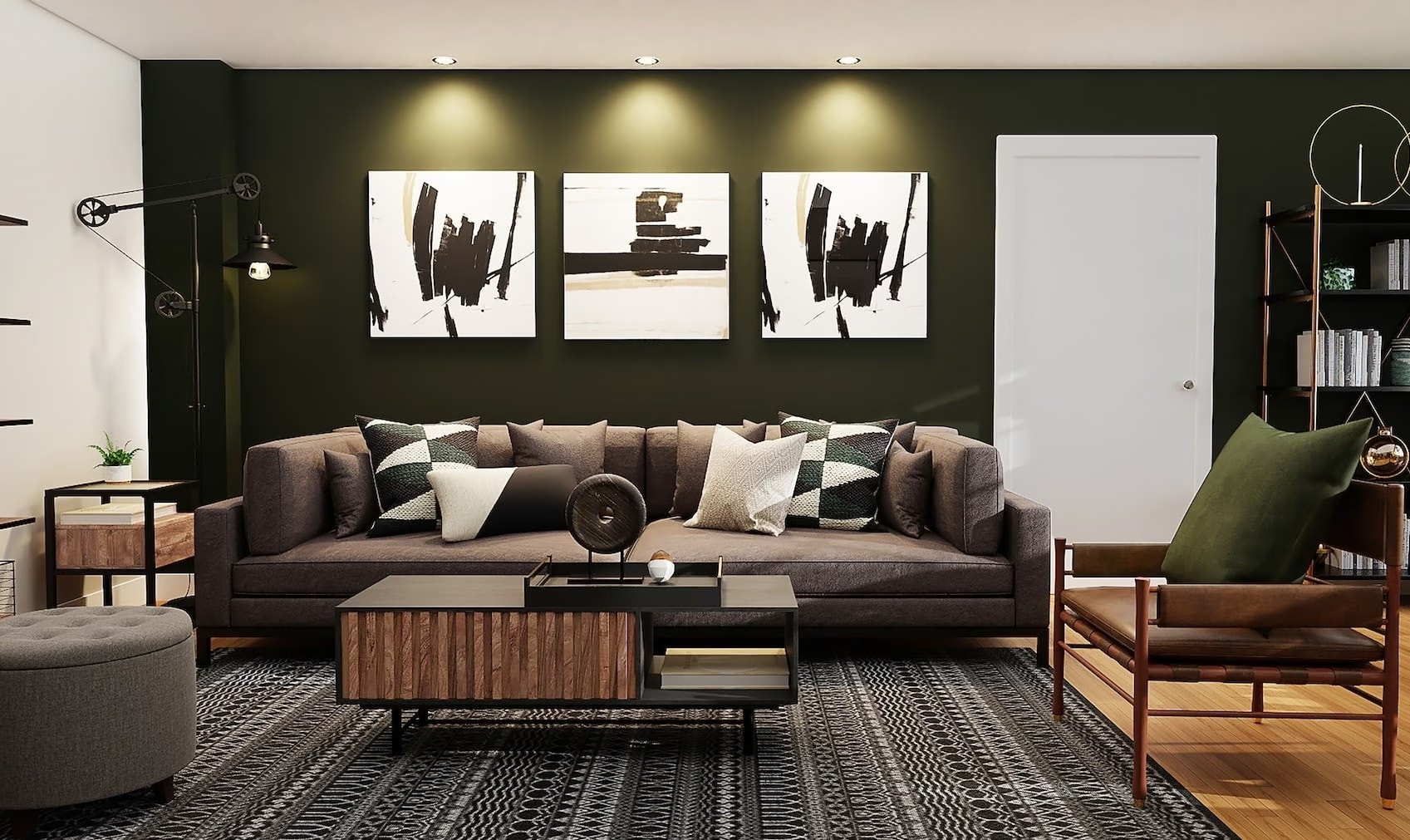 A living room with green walls and black furniture