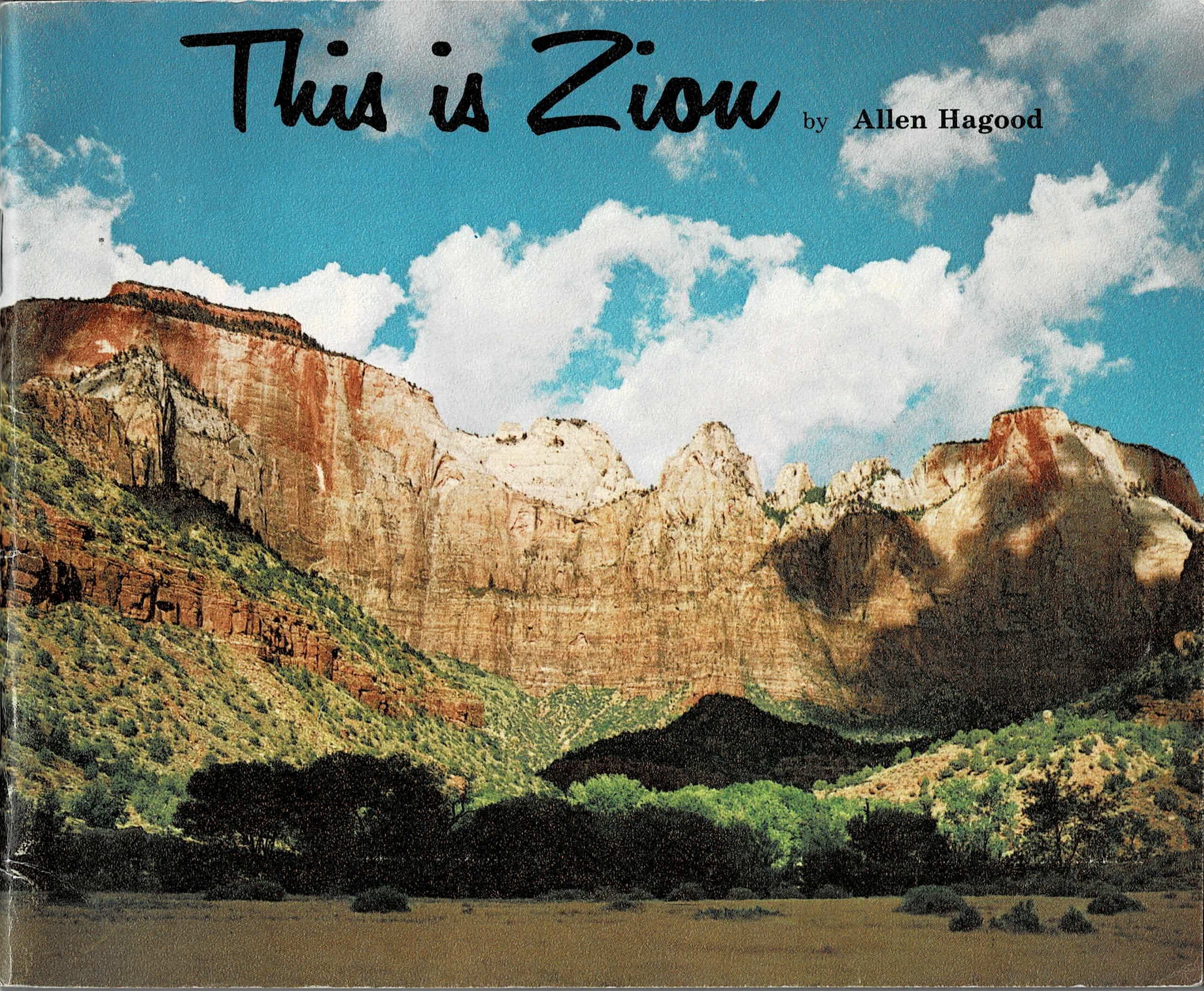 Front cover of This is Zion by Allen Hagood, showing sunlit Navajo Sandstone cliffs above green canyon slopes
