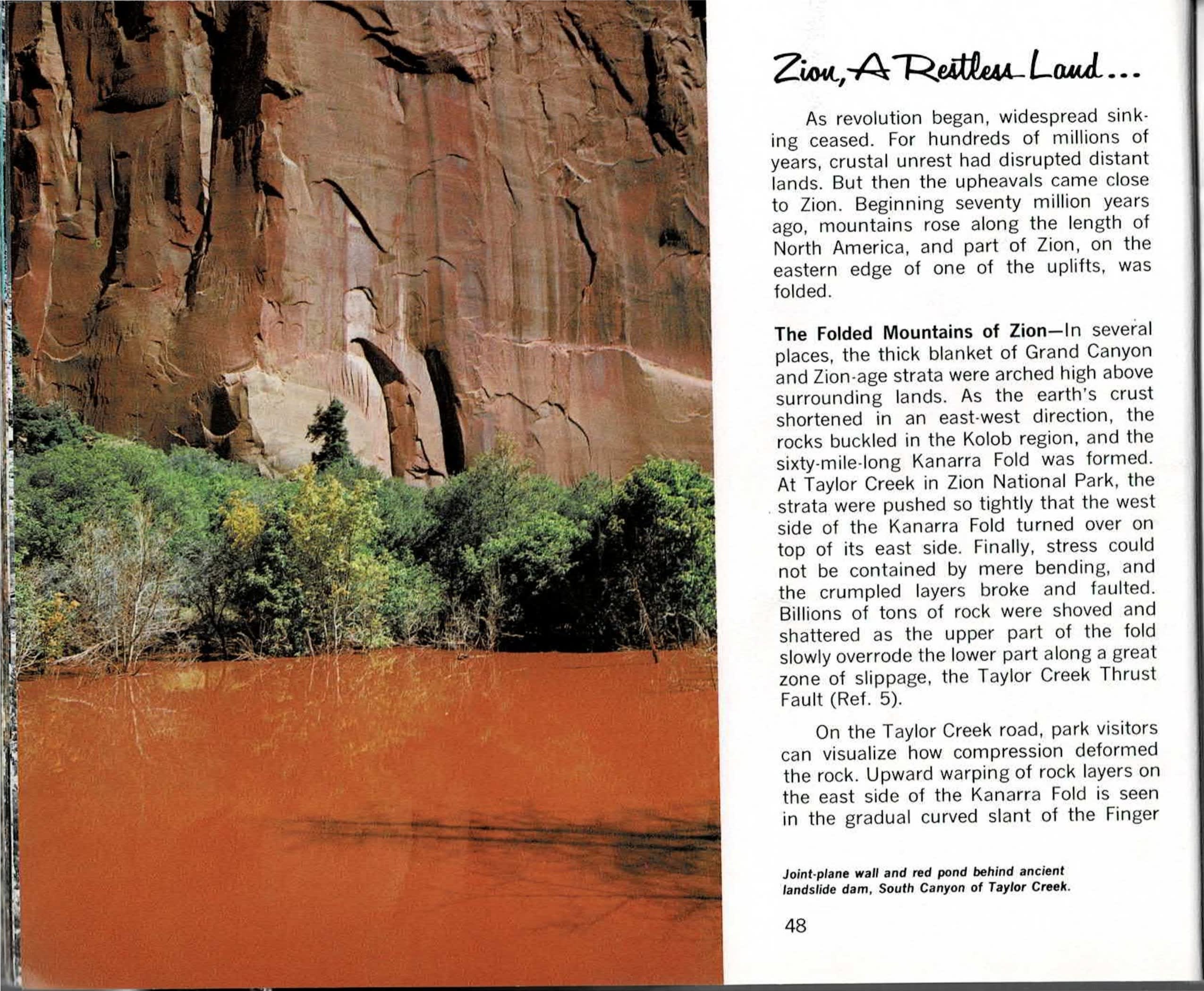 Colour spread with a joint-fissured red cliff above a rust-toned pond on the far left, printed text columns for pages 48 and 49 running down the center including the chapter opening Zion, A Restless Land, and a striped, deeply fluted sandstone alcove wall rising above green treetops on the far right.