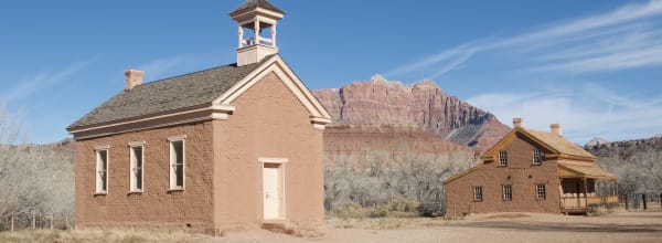 Grafton ghost town schoolhouse and red Zion canyon walls