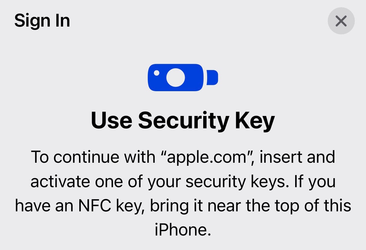 Notification iPhone qui demande de brancher la clé de sécurité pour accéder à apple.com avec l'A2F