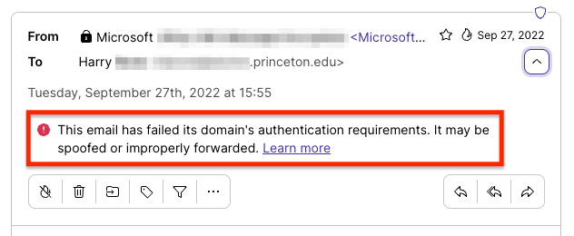 Avertissement d'authentification du domaine Proton Mail indiquant que l'adresse e-mail peut avoir été altérée et que les pièces jointes peuvent être dangereuses.