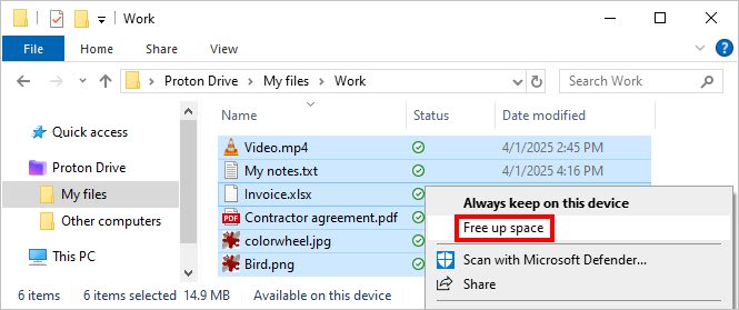 Proton Drive shows how to make a file cloud-only by choosing "Free up space" from the right-click menu in the Windows File Explorer