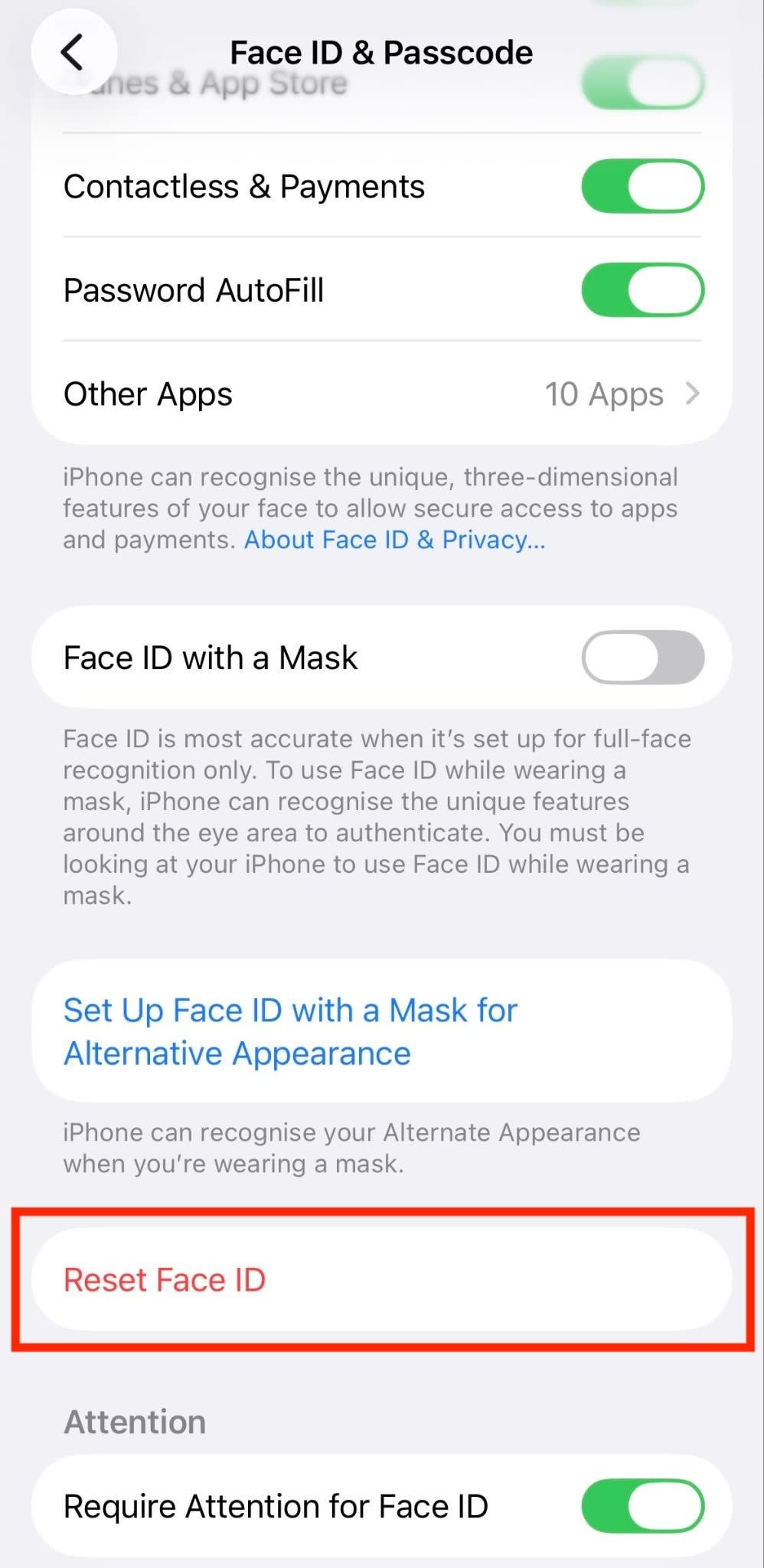 iOS settings screen with Reset Face ID highlighted.