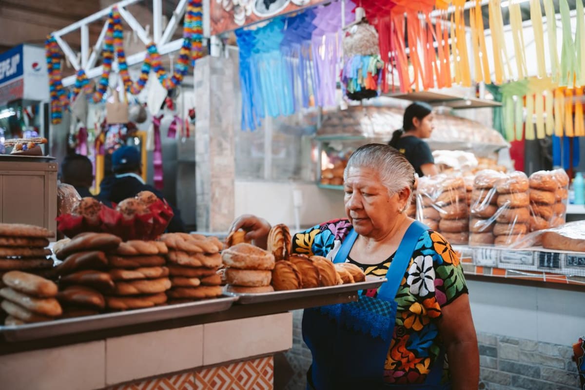 Colorful Oaxacan market stall with fresh produce and traditional food ingredients