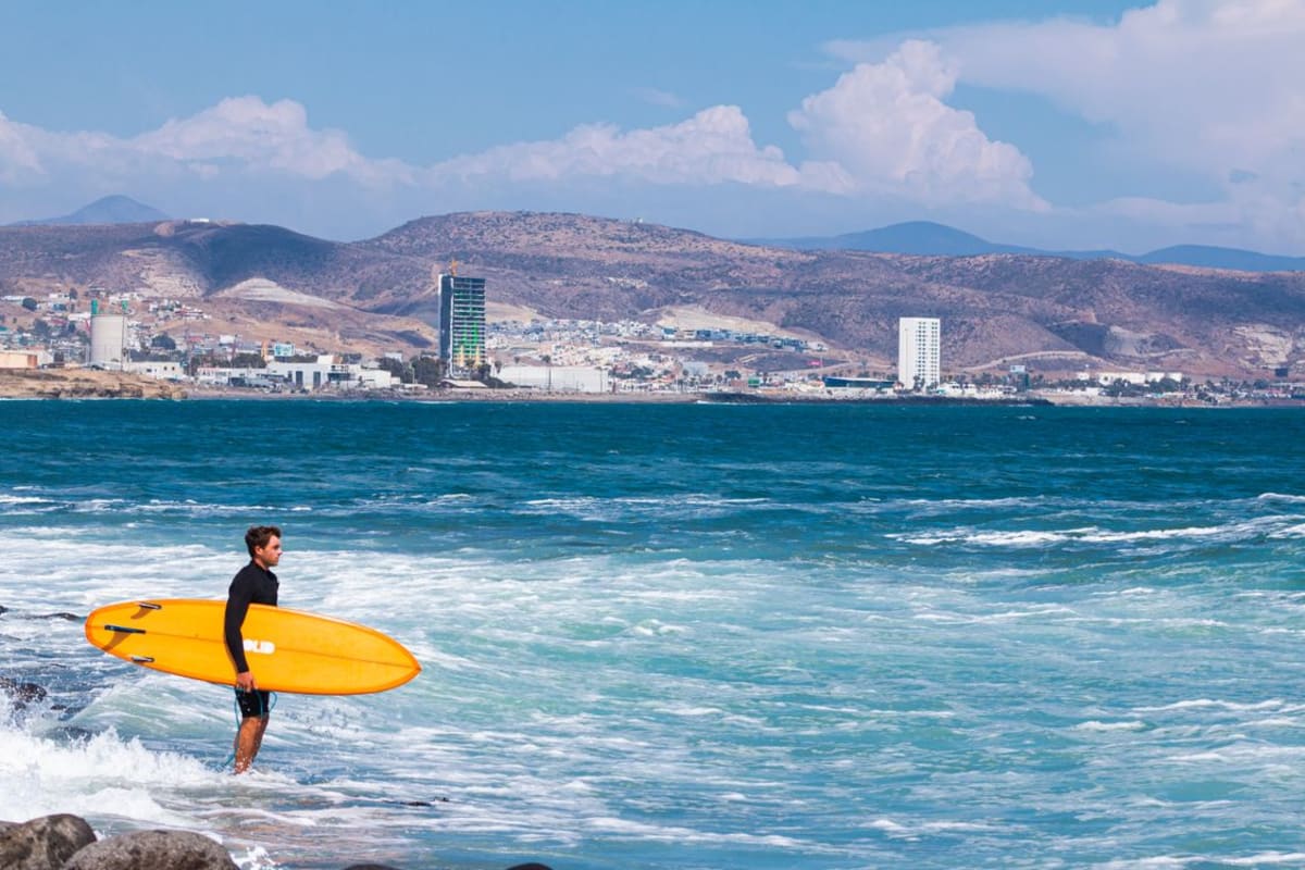 Warm Pacific beach and surf conditions in Puerto Escondido during Canadian winter months