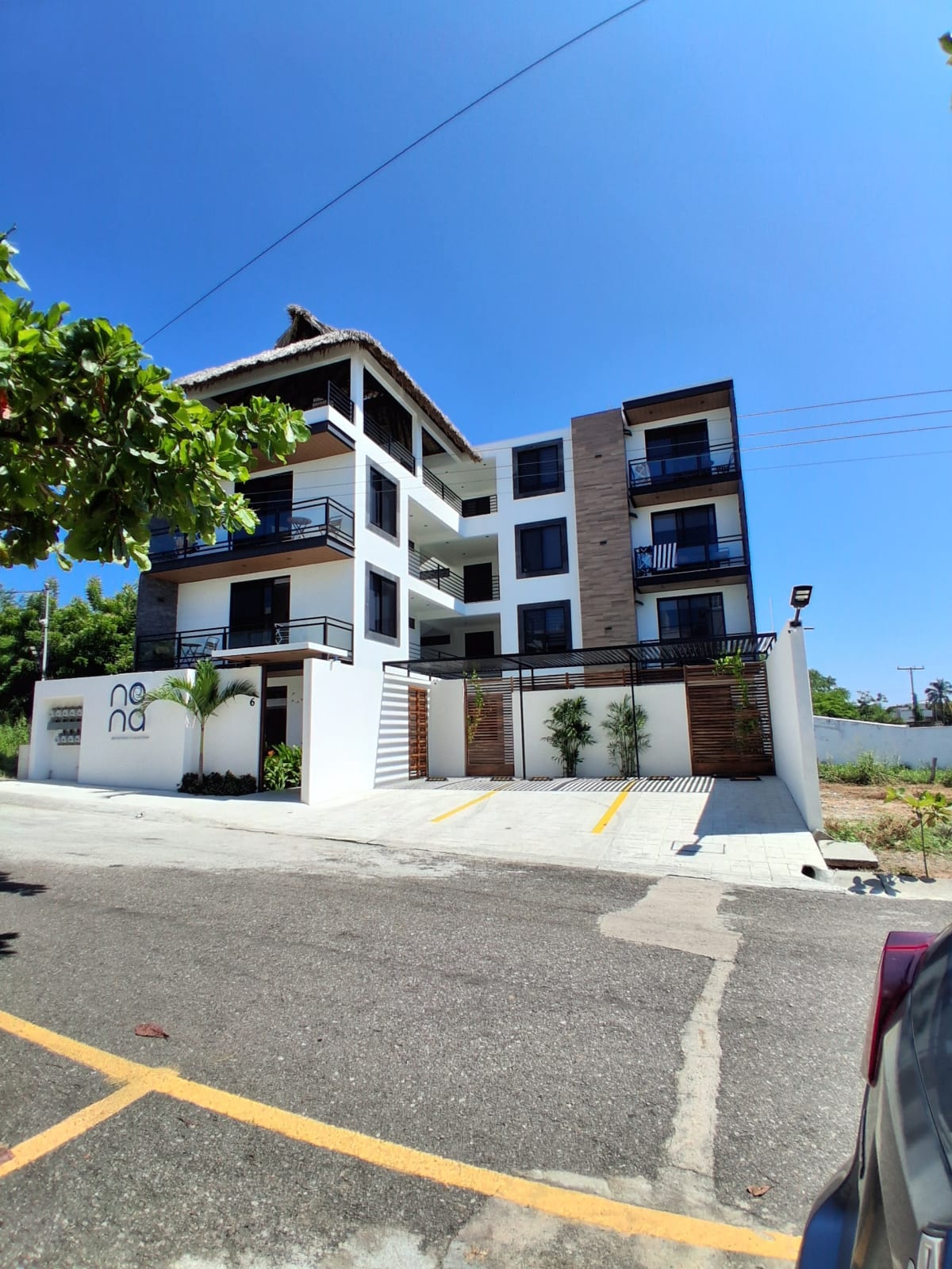 NONA Apartments + Suites