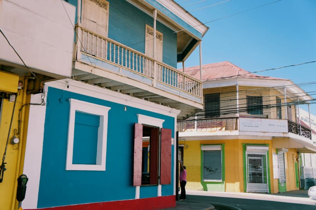 Colourful neighbourhood street in Mexico — affordable furnished apartments in Puerto Escondido's La Punta and Zicatela range from $400 to $1,200 USD per month in 2026