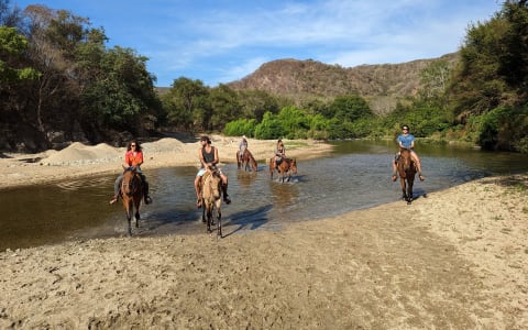 crossing river by horse