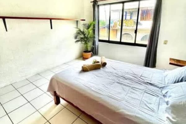 Depa cyrill frente playa Zicatela con AC y alberca - Three-Bedroom Apartment