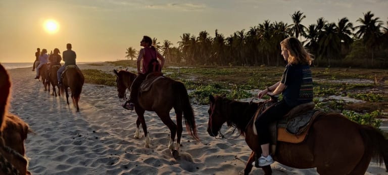 horse riding on the beach