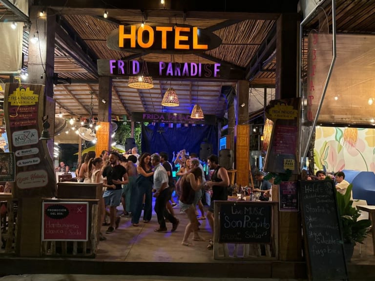 Hotel Frida Paradise entrance with live music at night