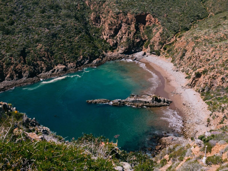 Secluded rocky cove with turquoise waters on the Mexican Pacific coast