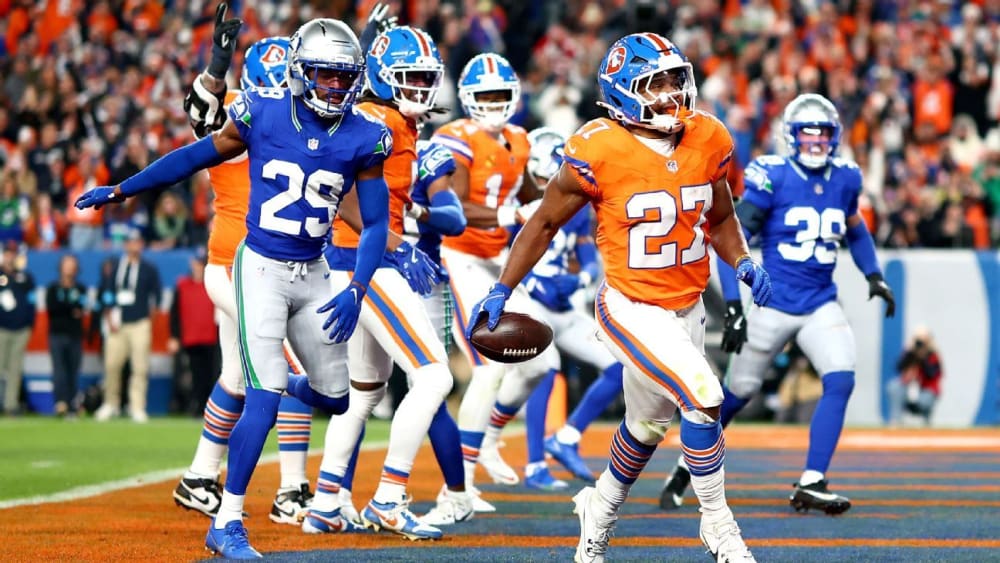 Un joc d'execució, el poder de defensa Broncos d'OT guanyar contra el marhawks