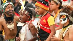 Aficionats de Papua Nova Guinea animant la seva selecció de rugbi a tretze.