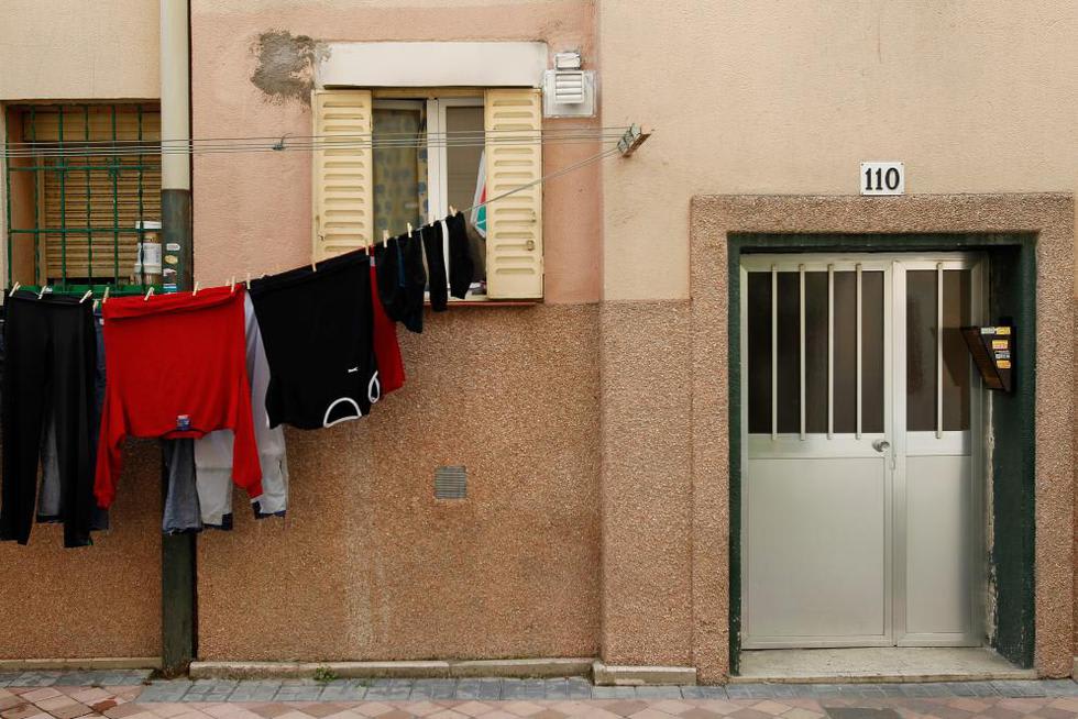 El meu pis està en una planta baixa. Qui ha de pagar la pintura i manteniment de les reixes?