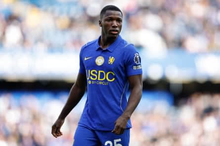 Moisés Caicedo in action for Chelsea, wearing blue kit.