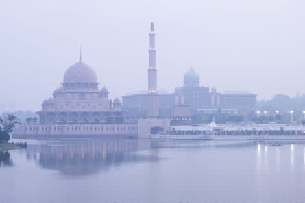 Putra Mosque and the Prime Minister’s Office covered in haze in Putrajaya, Malaysia.
