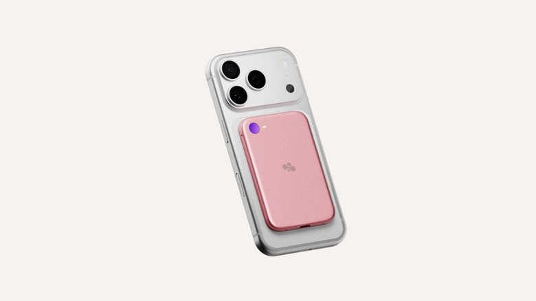 A pink Bee Eclipse on the back of a silver iPhone.