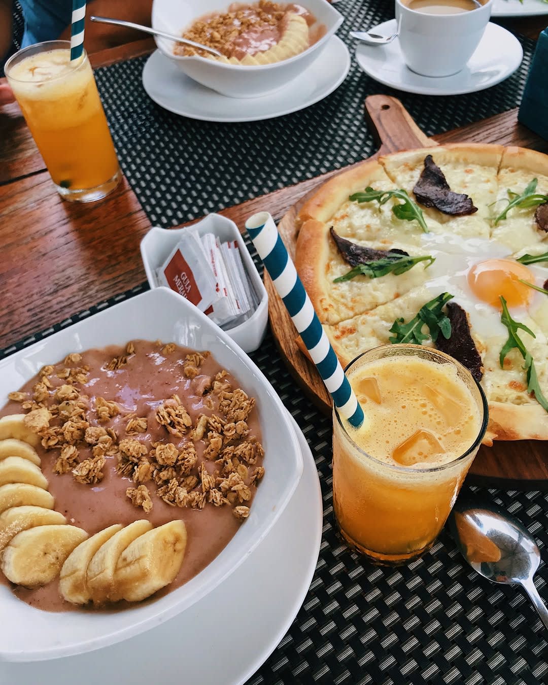 Let's help a family who's travelling to Bali soon...

You can only recommend ONE café that's genuine