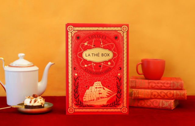 illustrated Orient Express tea box beside a cup of tea