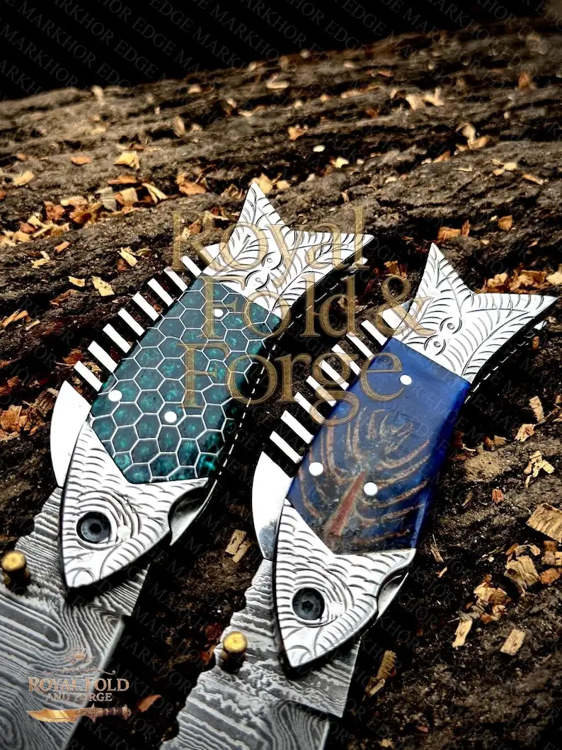 Detailed view 2 of Hand-forged Damascus steel Damascus Fish Design Folding Tool – Unique Handcrafted Steel Edge with Vibrant Colored Handles