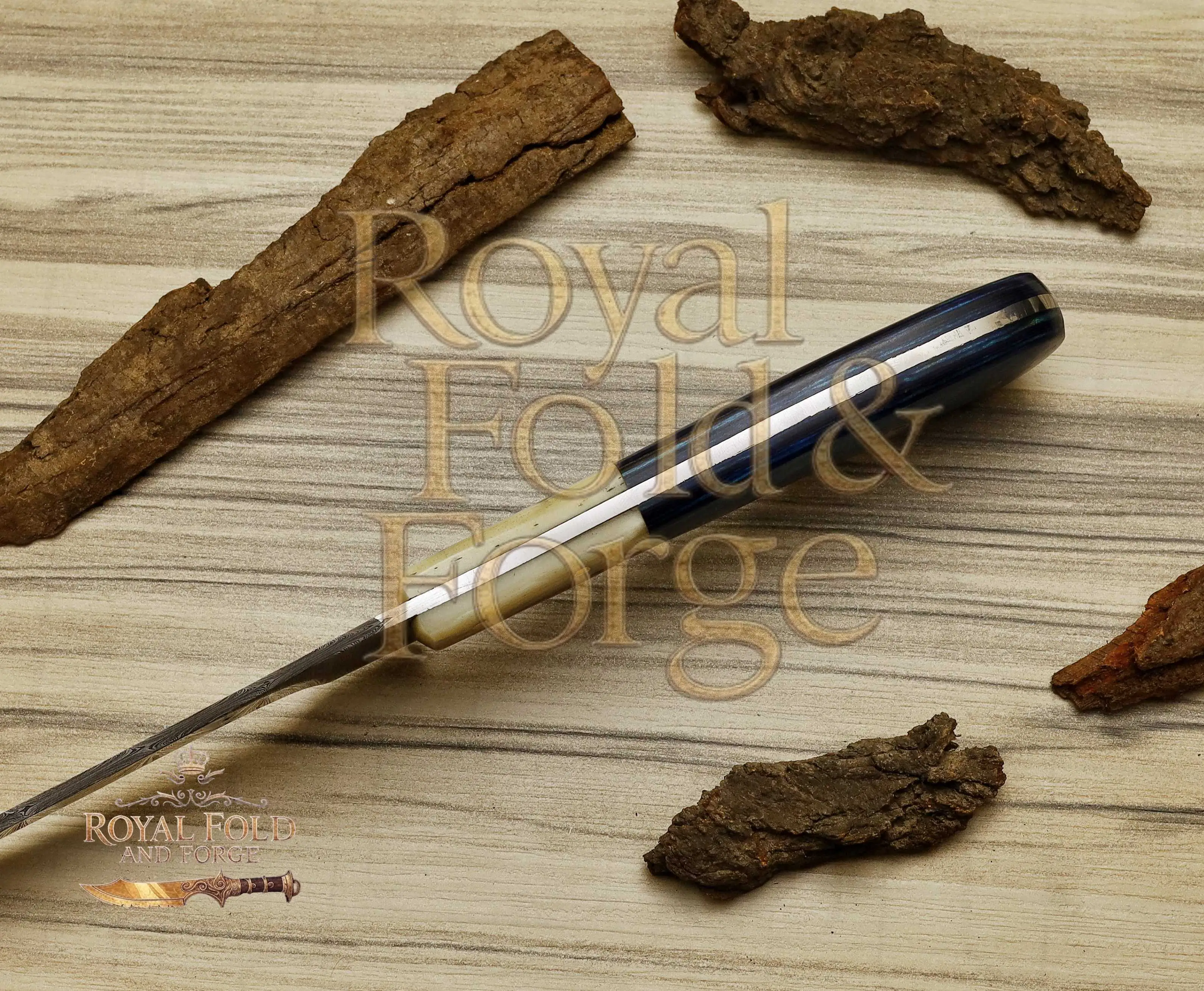 Detailed view 4 of Hand-forged Damascus steel Hand-Forged Damascus Steel Fillet Utensil with Multicolor Handle – Royal Fold & Forge