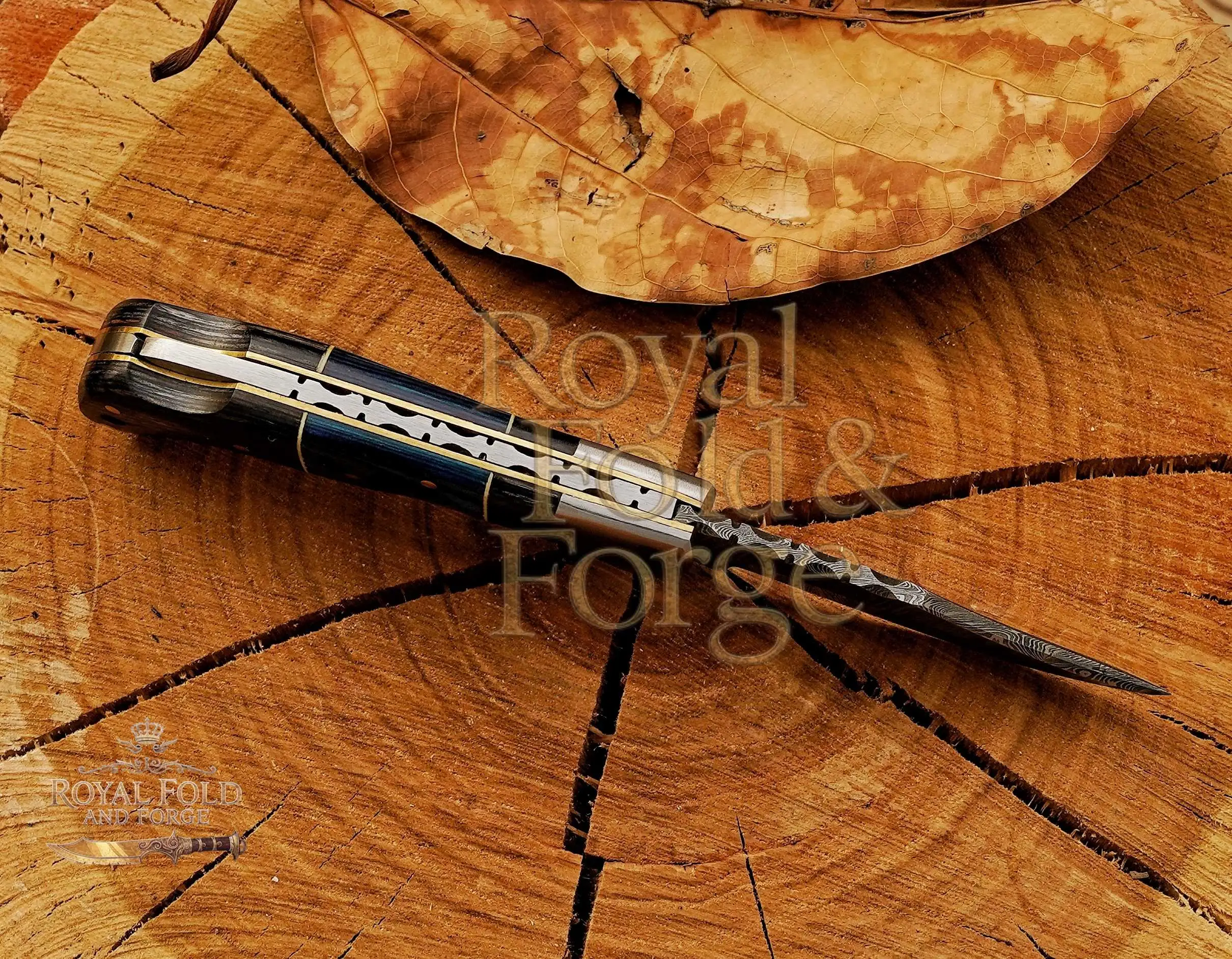 Detailed view 2 of Hand-forged Damascus steel Damascus Steel Camping Tool with Blue Handle