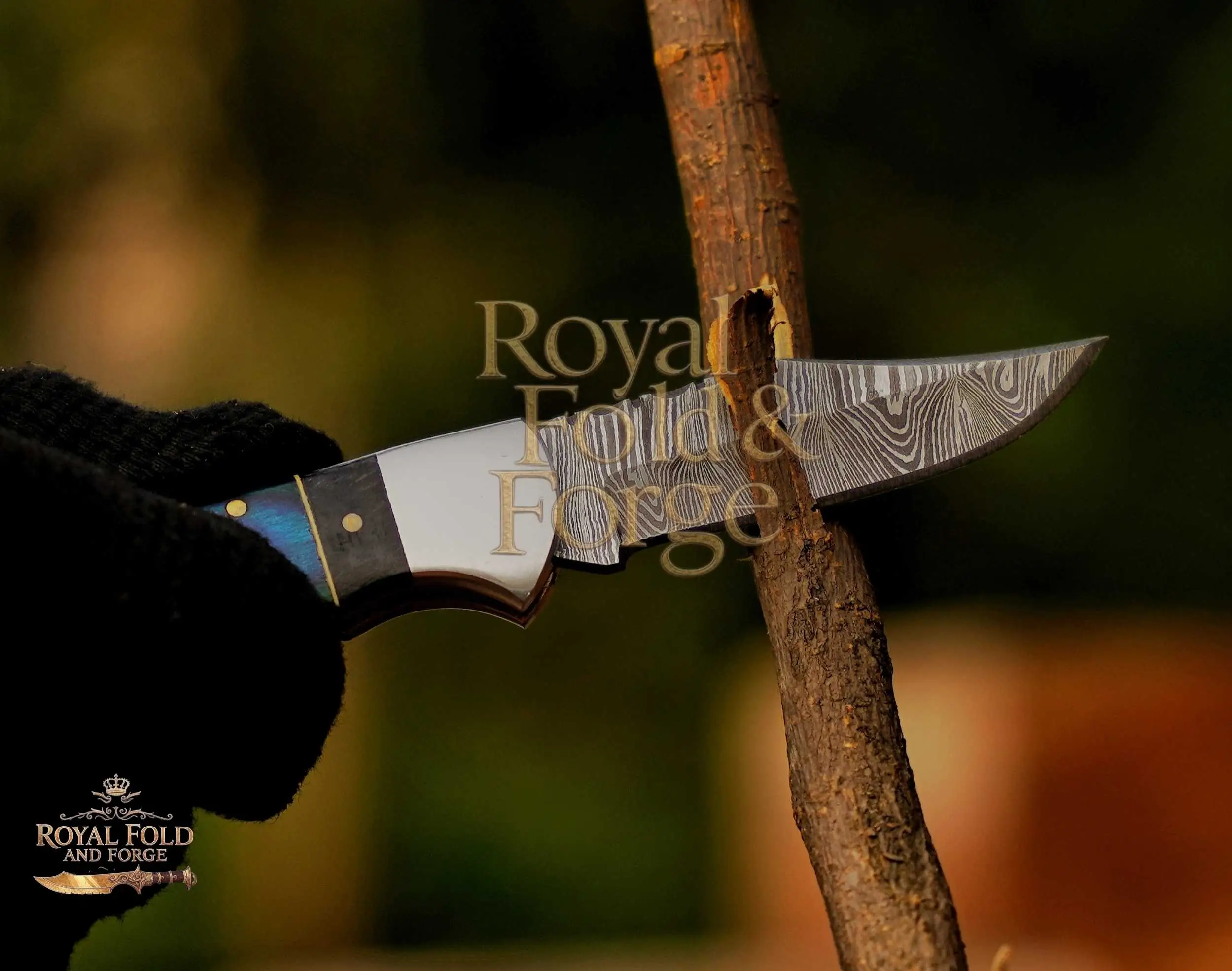 Detailed view 5 of Hand-forged Damascus steel Damascus Steel Camping Tool with Blue Handle