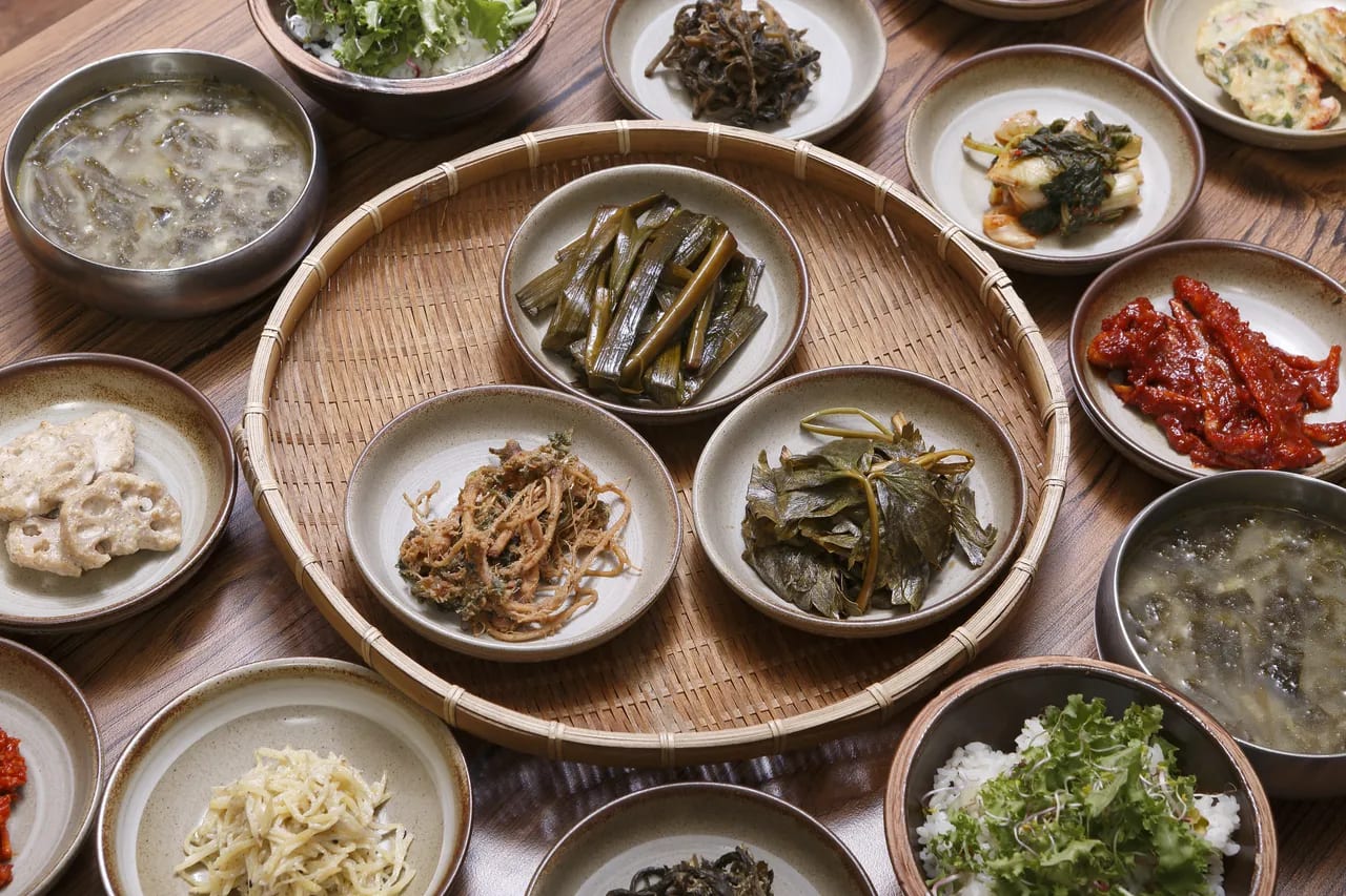 A traditional Korean table set with various side dishes (Banchan) showcasing Korean food culture.