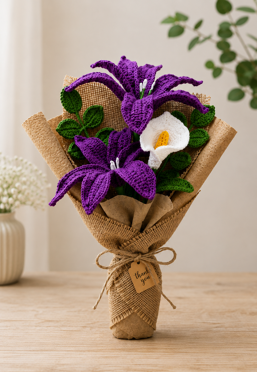 Handmade crochet lily bouquet in rustic jute wrapping.