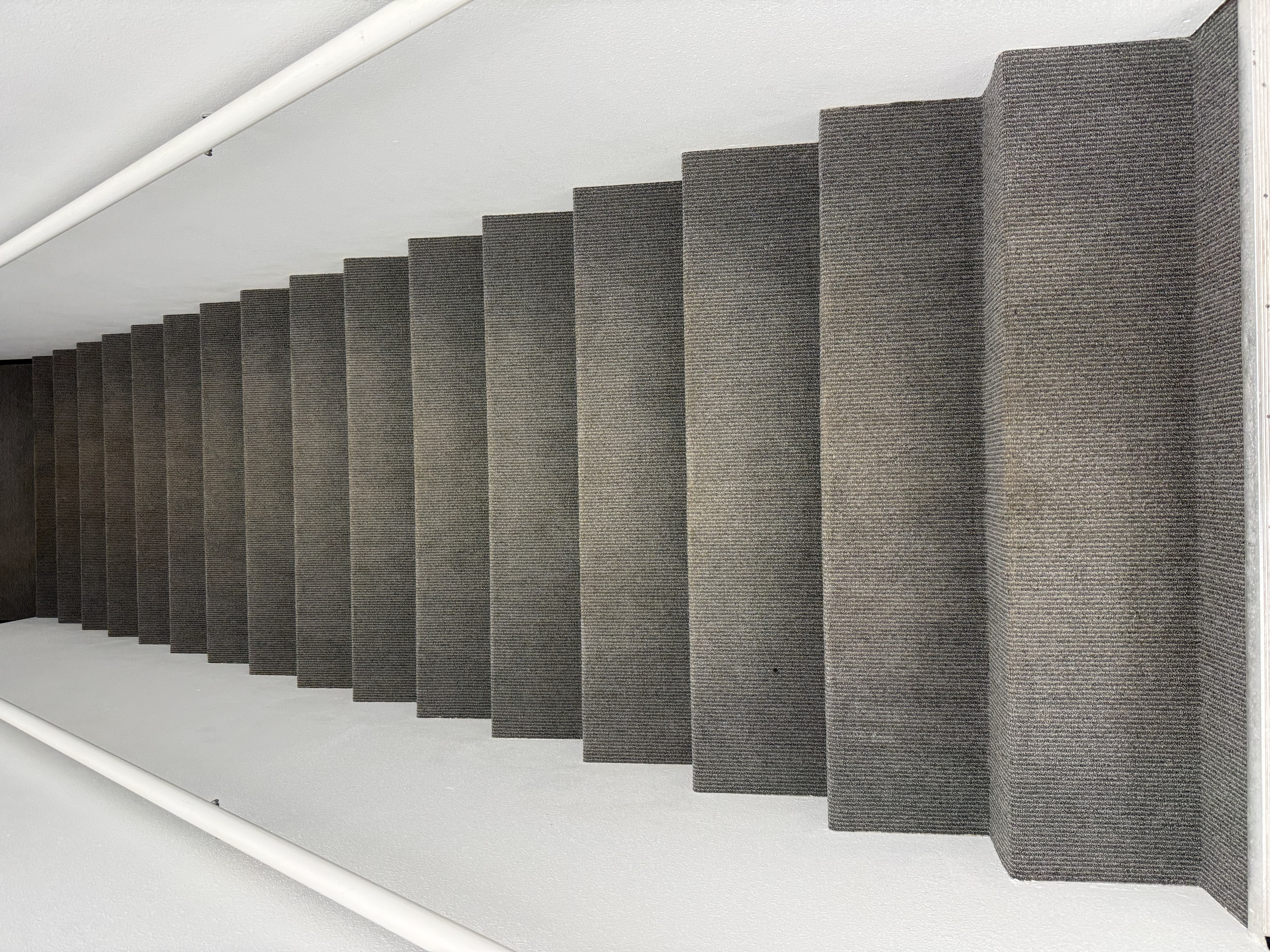 Carpet on stairs going down after cleaning