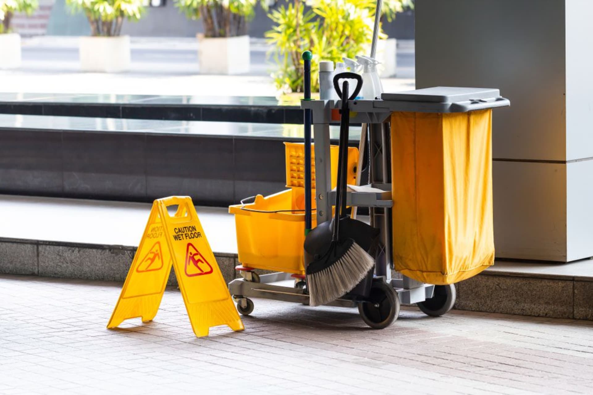 Janitorial cart with supplies positioned for daily cleaning tasks
