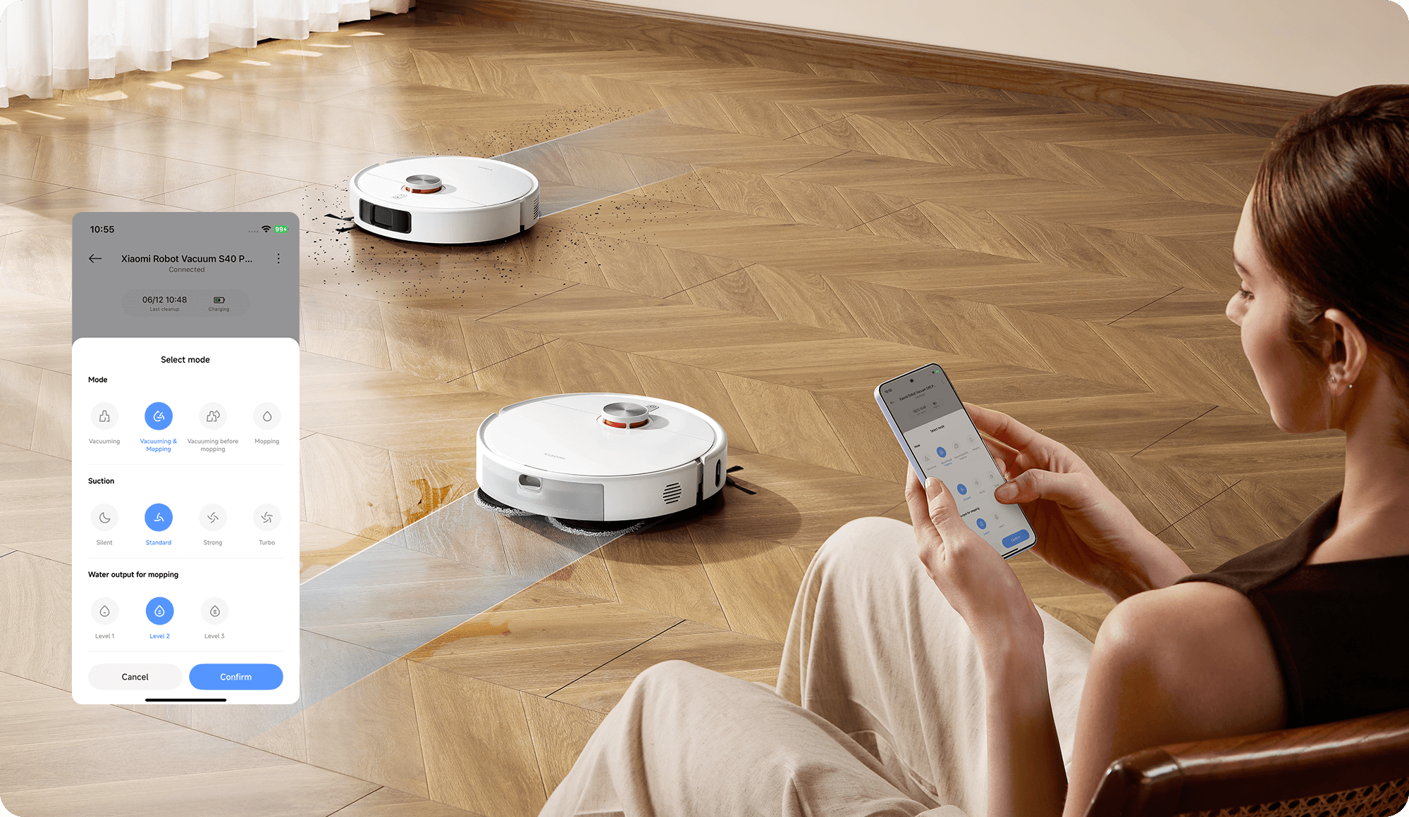 Robot aspirador Xiaomi S40 limpiando suelo de madera controlado por app móvil Xiaomi Home