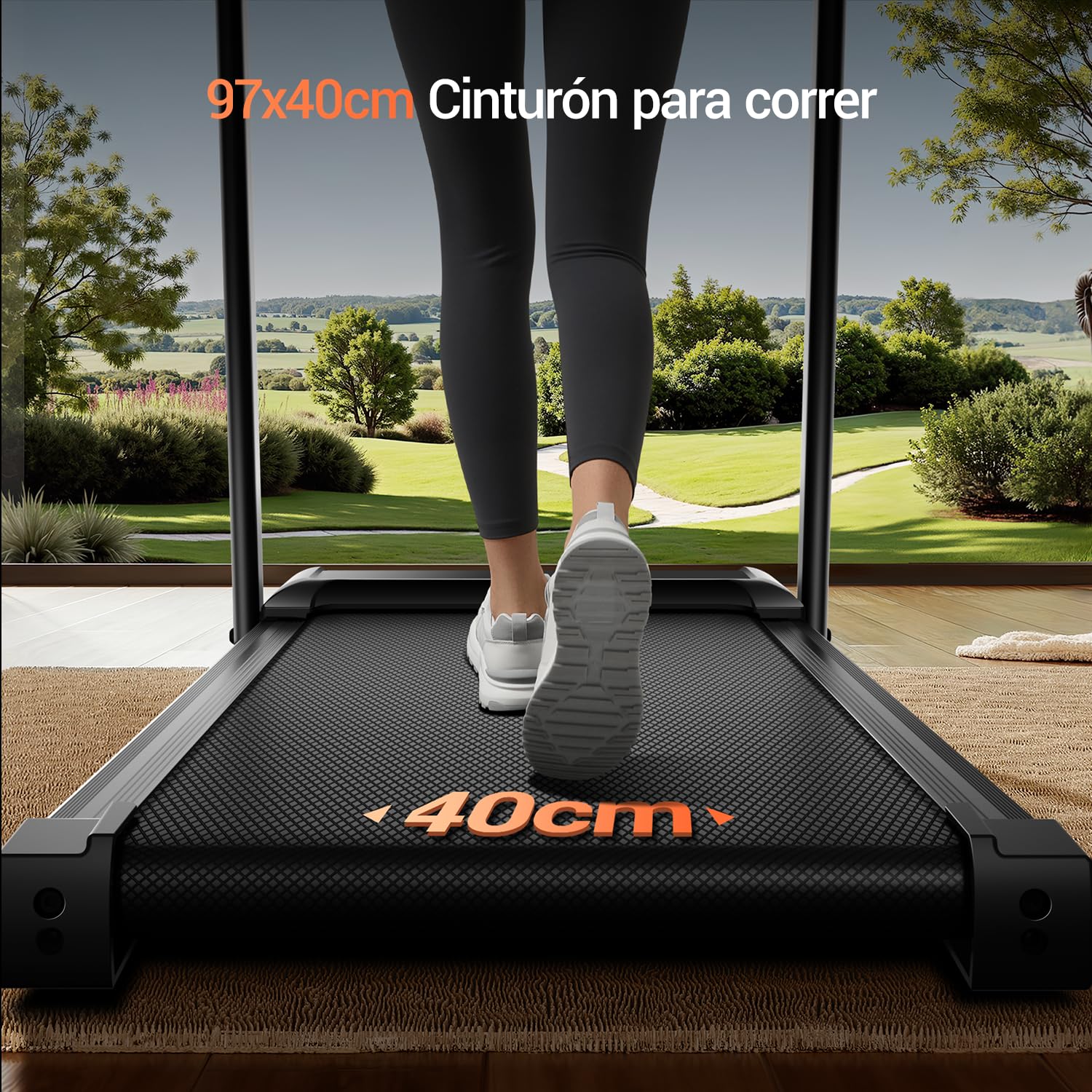 Cinta de correr plegable con banda de 40cm de ancho en uso, vista trasera con paisaje verde de fondo
