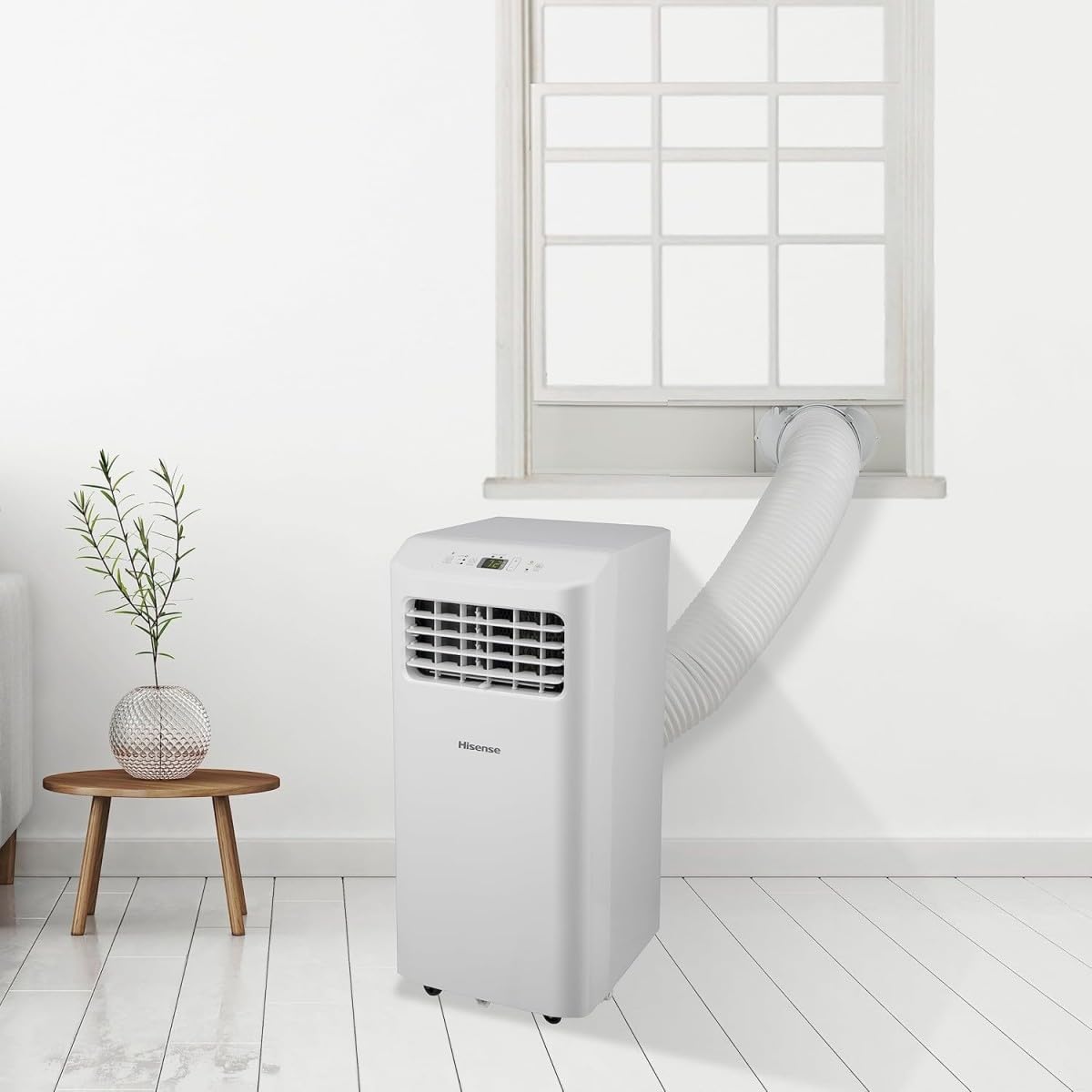 Aire acondicionado portátil Hisense APC07KV con tubo de escape en ventana