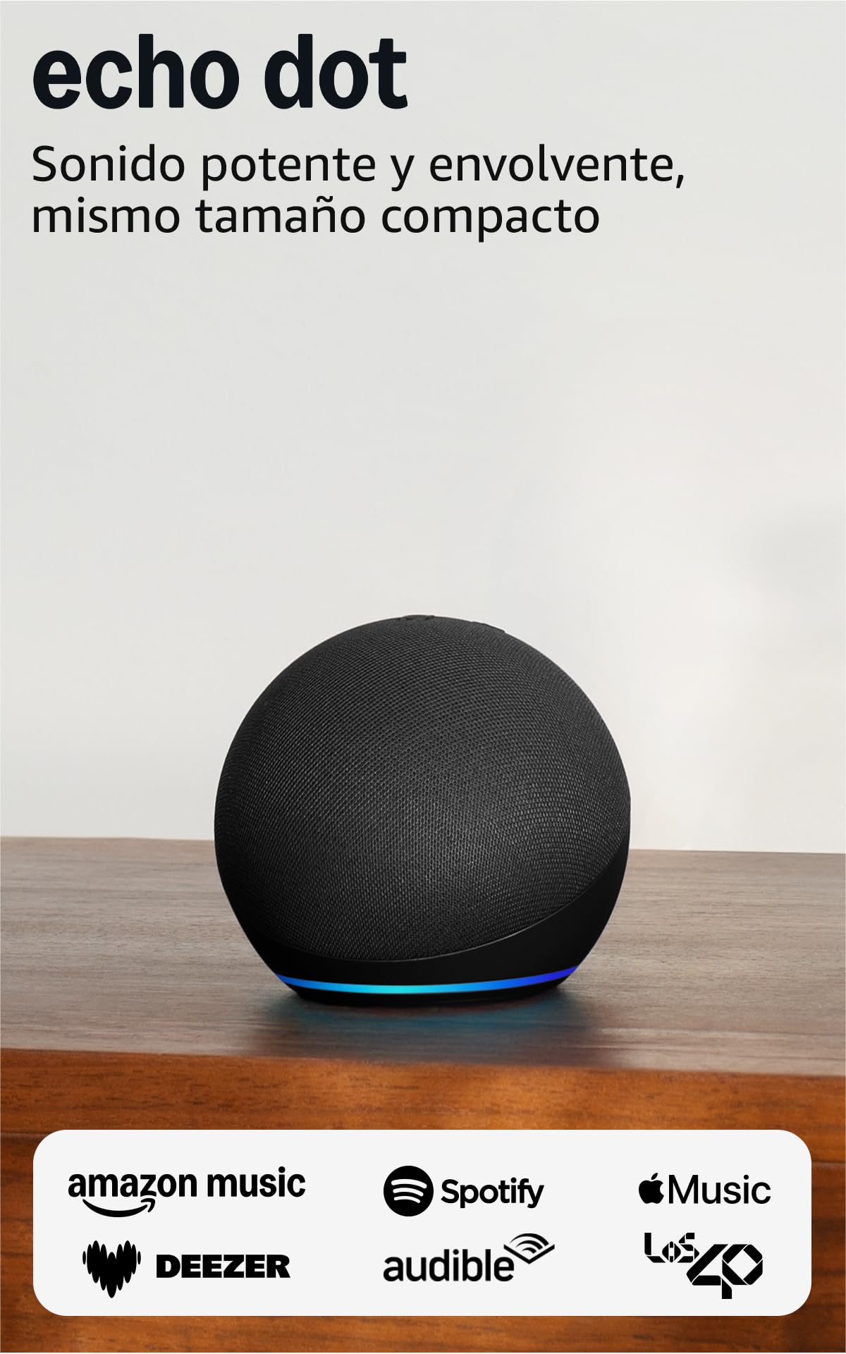Echo Dot antracita con luz LED azul sobre mesa de madera