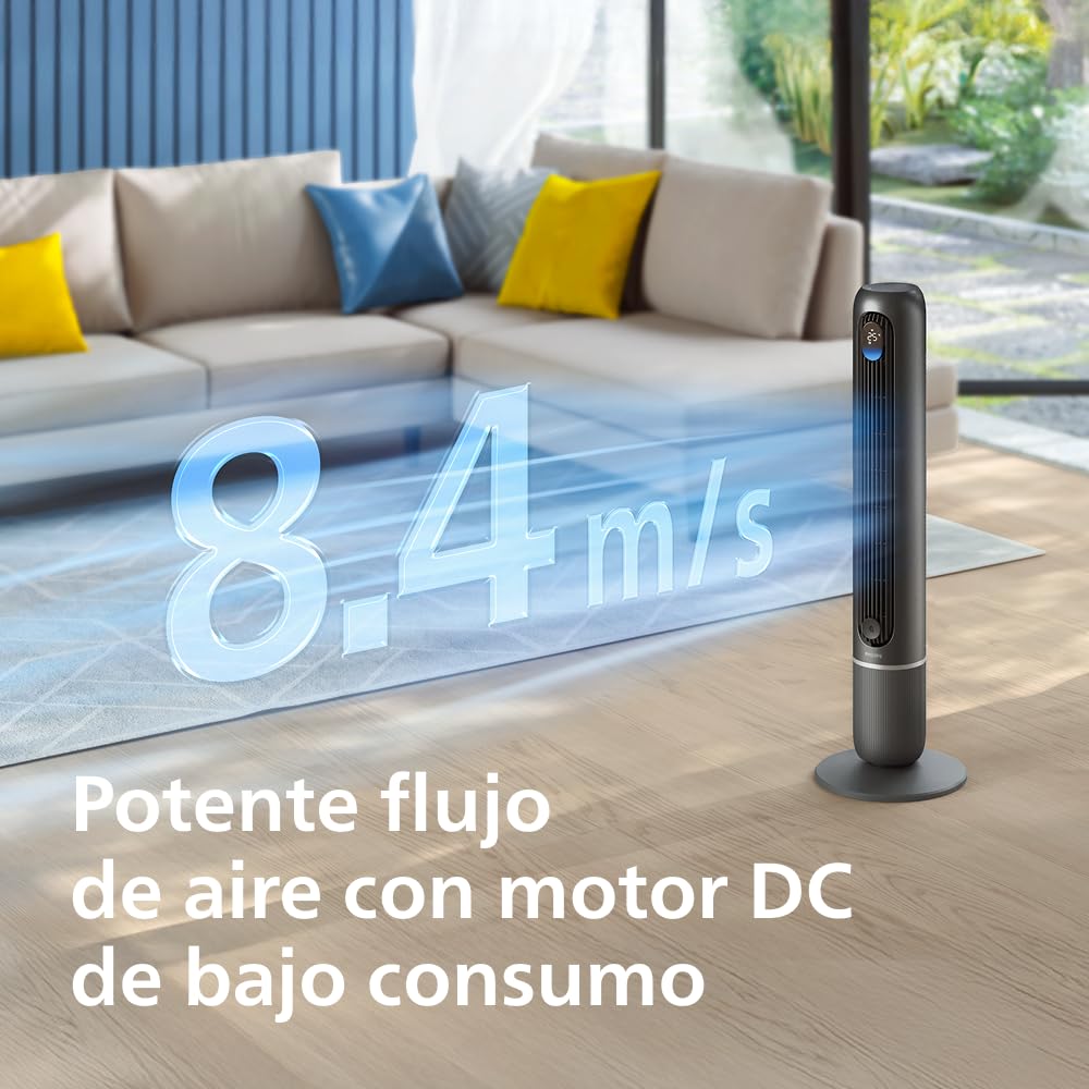 Ventilador de torre Philips Serie 7000 que proporciona un flujo de aire de 8,4 m/s en una sala de estar moderna.