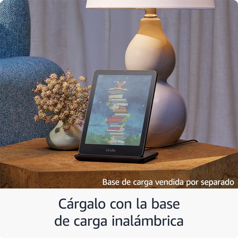 E-reader sobre mesa con lámpara, flores y texto de base de carga.
