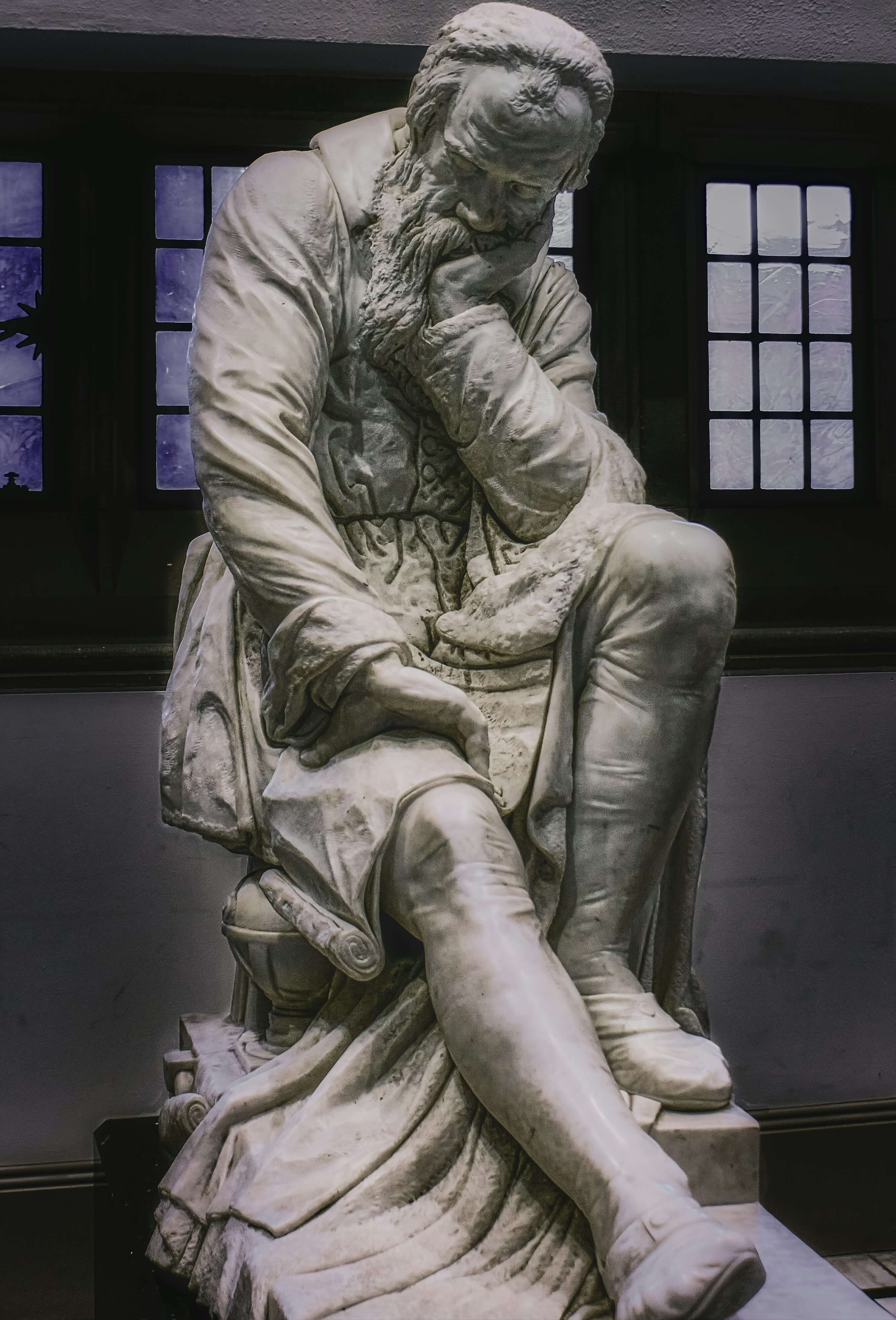 Marble sculpture of Galileo Galilei contemplating the nature of the universe