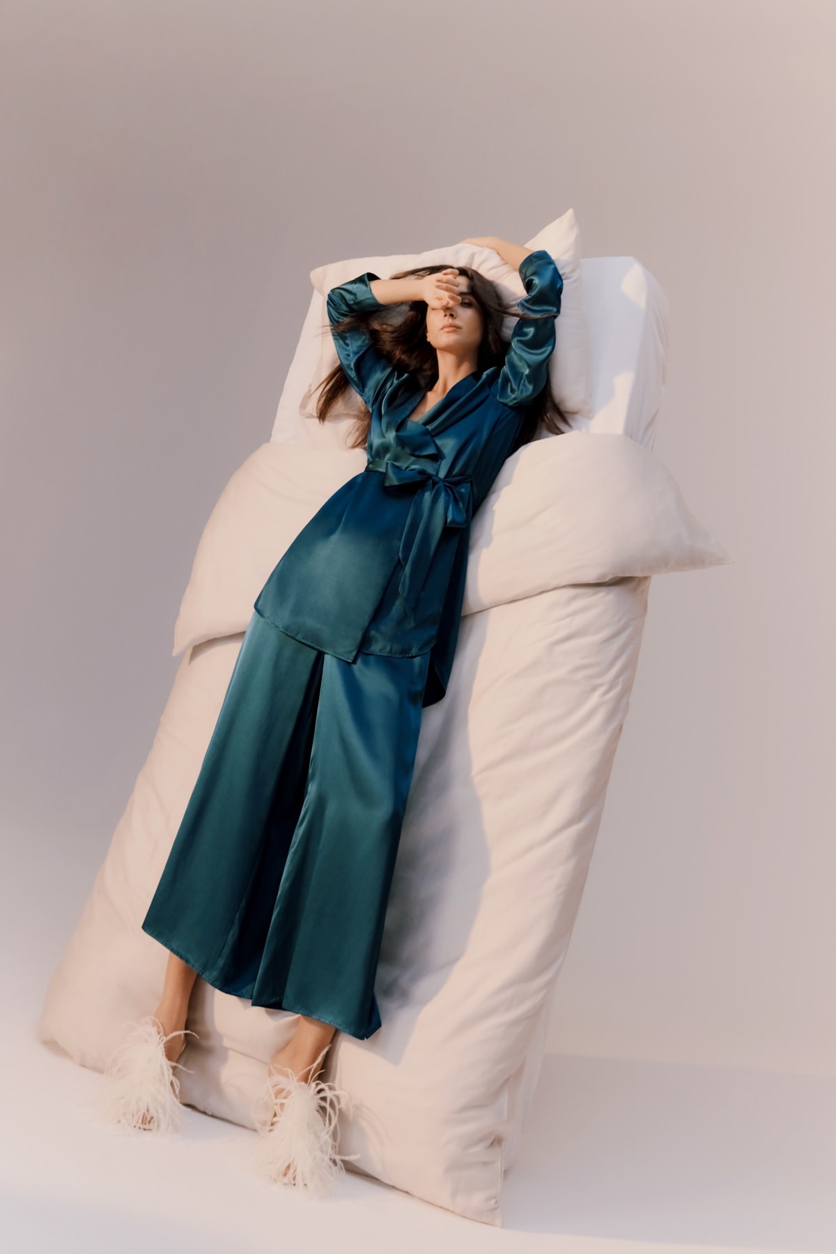 model posing in silk