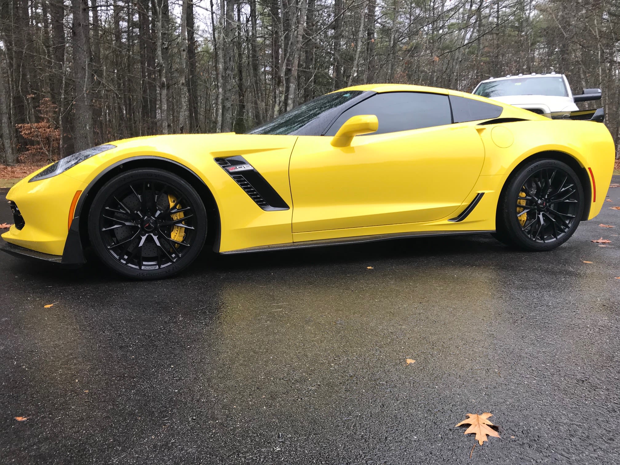Yellow Chevrolet Corvette Z06 coupe with tinted windows